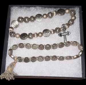 Pair stretch silvertone bohemian bracelets silvertone medallions, cross, tassel